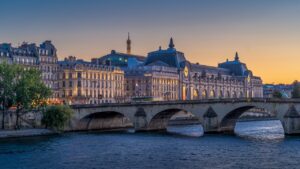 A photo of the Musee d'Orsay along the Seine.