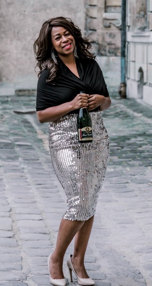 A photo of Tanisha Townsend from Girl Meets Glass, podcast host, and guide for wine tours in Paris