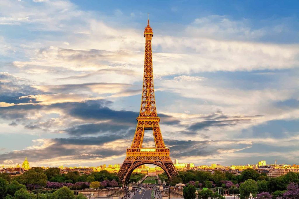 A photo of the Eiffel Tower at sunrise, symbolizing the new Paris