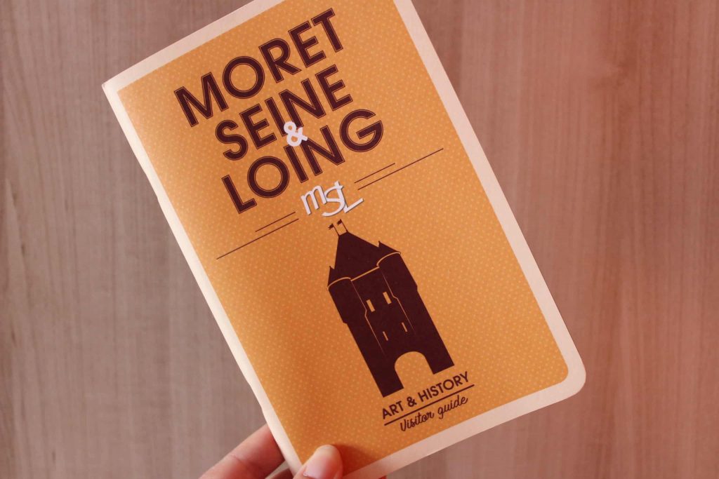 A photo of the guidebook given out at the Tourism Office of Moret-sur-Loing.