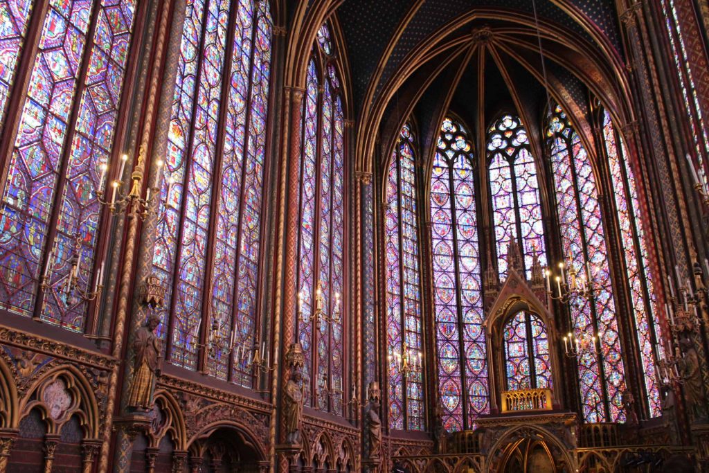 A photo of the nave of Sainte-Chapelle, taken from the side to show off more of the windows.