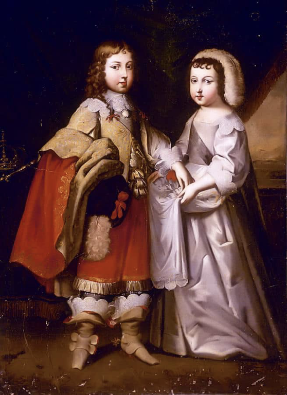 A photo of Louis and Philippe as children. Louis is dressed as a boy, while Philippe is dressed as a girl.