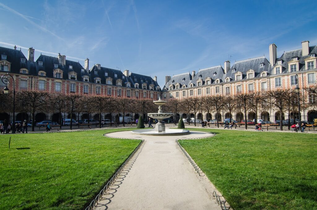 A photo of Place des Vosges in the 4e arrondissement of Paris.